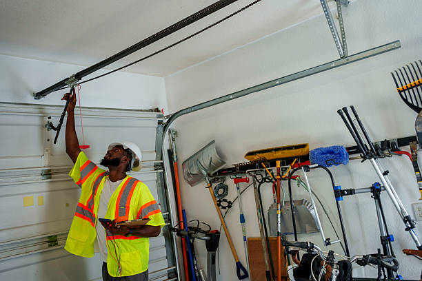 Professional Garage Door Panel Replacement technician working in Harristown, IL